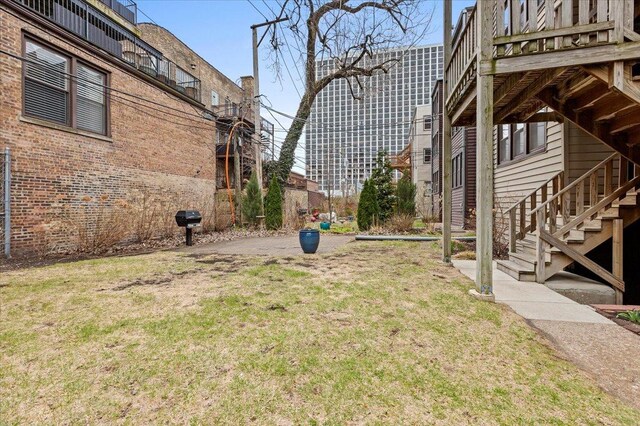 view of yard featuring stairway