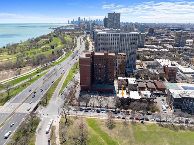 aerial view with a city view and a water view