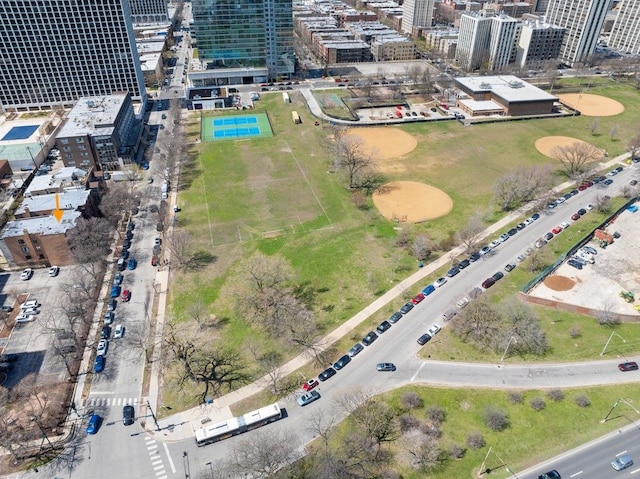 birds eye view of property featuring a city view