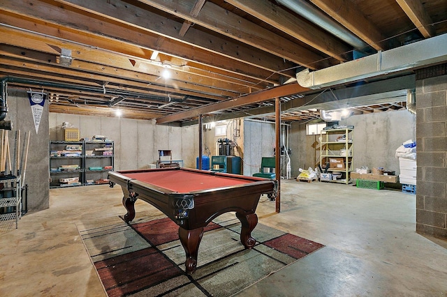 rec room featuring pool table and unfinished concrete floors