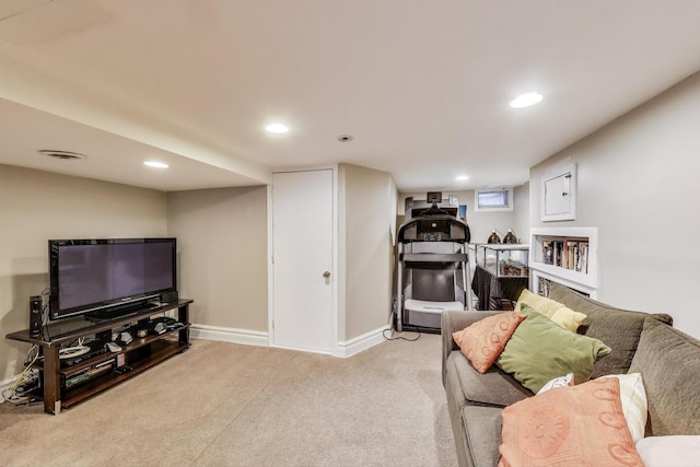 carpeted living area featuring baseboards, visible vents, and recessed lighting
