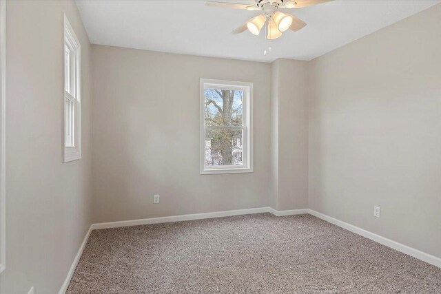 1980 W Forest Ave, Decatur, IL 62522 - empty room featuring ceiling fan, baseboards, and carpet floors