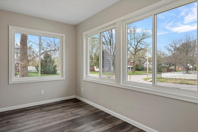 1980 W Forest Ave, Decatur, IL 62522 - empty room with baseboards and dark wood finished floors