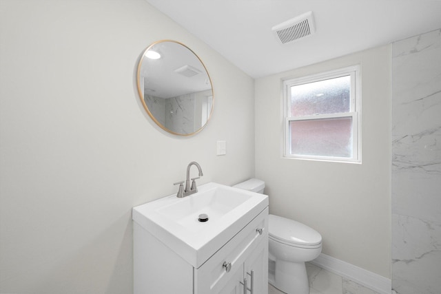 full bath featuring toilet, visible vents, baseboards, marble finish floor, and vanity
