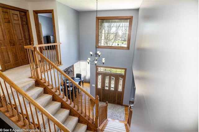 foyer featuring a notable chandelier