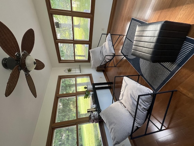 7919 Windspoint Rd, Roscoe, IL 61073 - living area with a high ceiling and ceiling fan