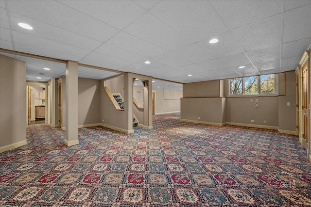basement with baseboards, carpet flooring, recessed lighting, and stairs