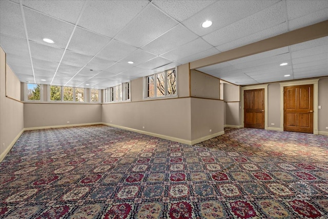 below grade area featuring baseboards, carpet floors, and recessed lighting