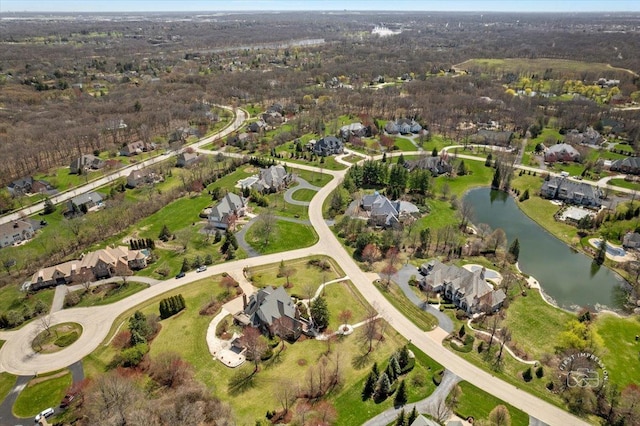 aerial view with a water view and a residential view