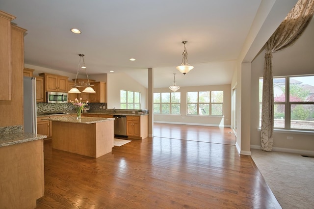 1866 Snead St, Bolingbrook, IL 60490 - kitchen with baseboards, open floor plan, a center island, tasteful backsplash, and appliances with stainless steel finishes