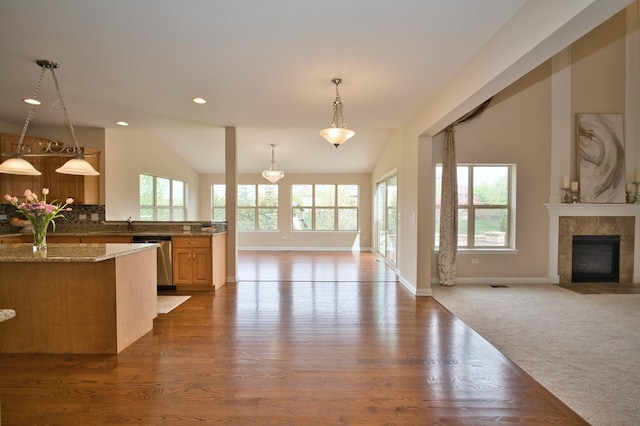 1866 Snead St, Bolingbrook, IL 60490 - kitchen featuring stainless steel dishwasher, open floor plan, decorative backsplash, and baseboards