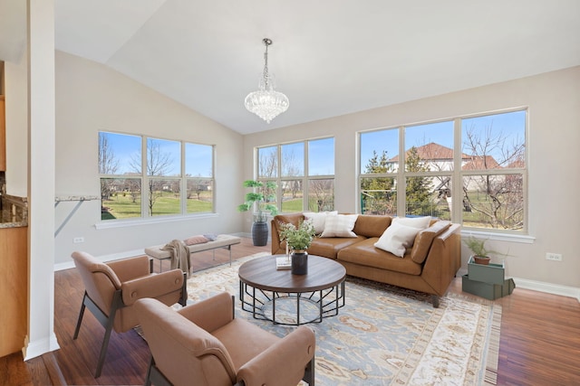 1866 Snead St, Bolingbrook, IL 60490 - living room with baseboards, lofted ceiling, wood finished floors, and a notable chandelier