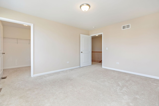 1866 Snead St, Bolingbrook, IL 60490 - unfurnished bedroom with carpet floors, baseboards, visible vents, and a spacious closet
