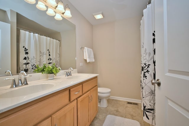 1866 Snead St, Bolingbrook, IL 60490 - bathroom with double vanity, toilet, visible vents, and a sink