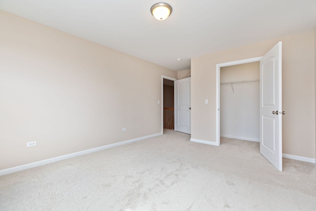 1866 Snead St, Bolingbrook, IL 60490 - unfurnished bedroom with baseboards, a closet, and light carpet