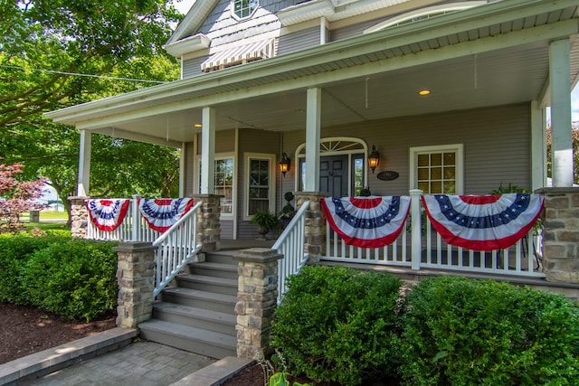 entrance to property with covered porch