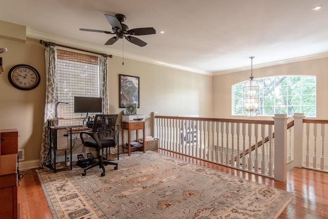office with crown molding, ceiling fan with notable chandelier, recessed lighting, and wood-type flooring