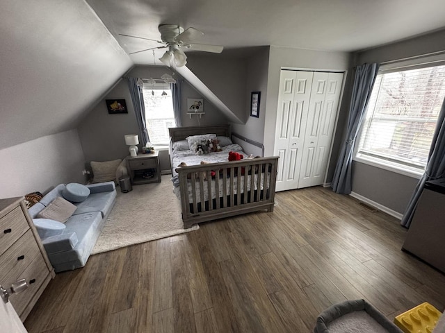800 Tomahawk Trl, Round Lake Heights, IL 60073 - bedroom with lofted ceiling, wood finished floors, multiple windows, and visible vents