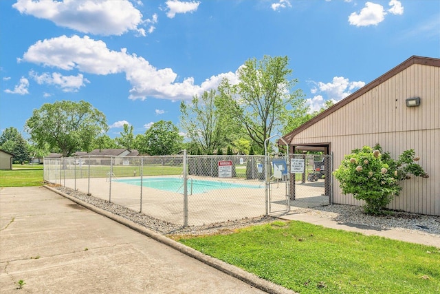 view of pool with a gate