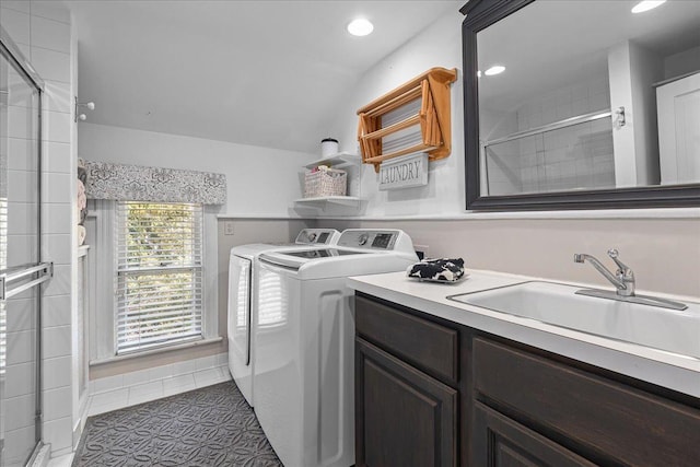 clothes washing area with recessed lighting, tile patterned floors, laundry area, a sink, and independent washer and dryer