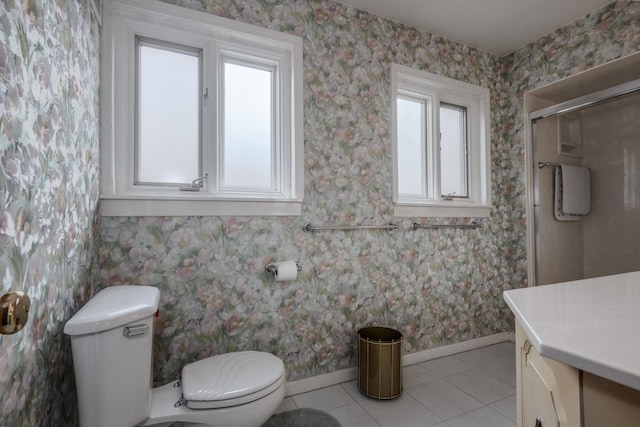 full bath with tile patterned floors, toilet, baseboards, wallpapered walls, and a shower stall
