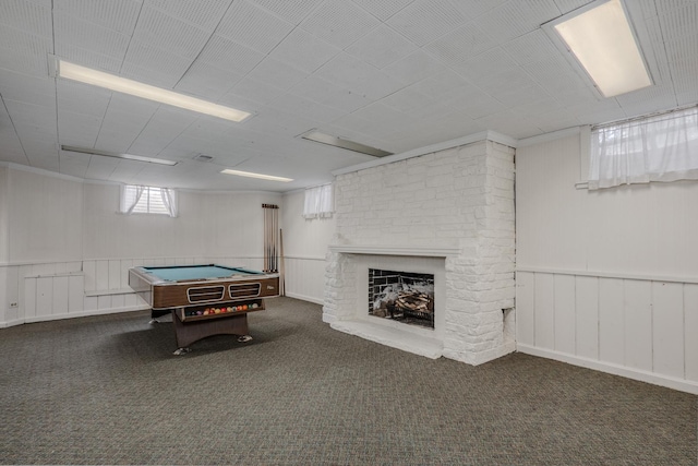 game room featuring a fireplace, carpet floors, a wainscoted wall, and billiards