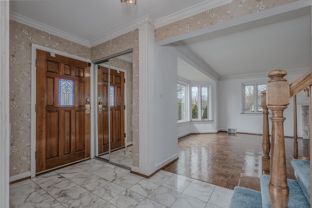entryway featuring stairway, baseboards, ornamental molding, and wallpapered walls