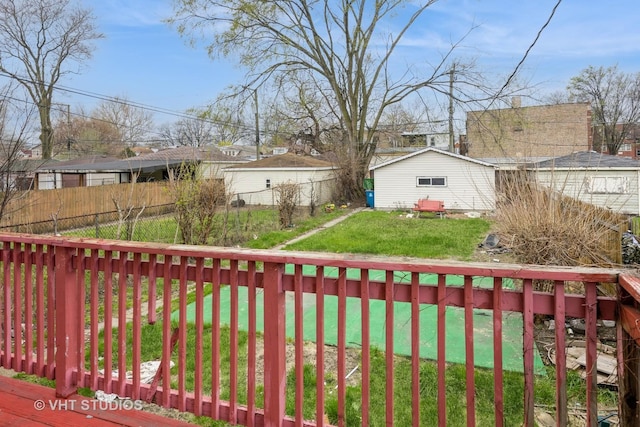 view of yard featuring an outdoor structure and a fenced backyard
