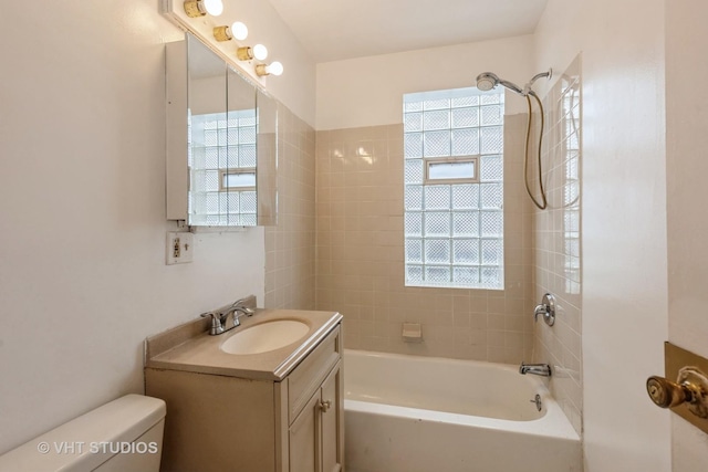 full bath with toilet, shower / bathtub combination, and vanity