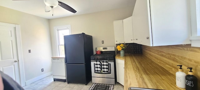 kitchen with ceiling fan, freestanding refrigerator, white cabinets, white dishwasher, and stainless steel gas range oven