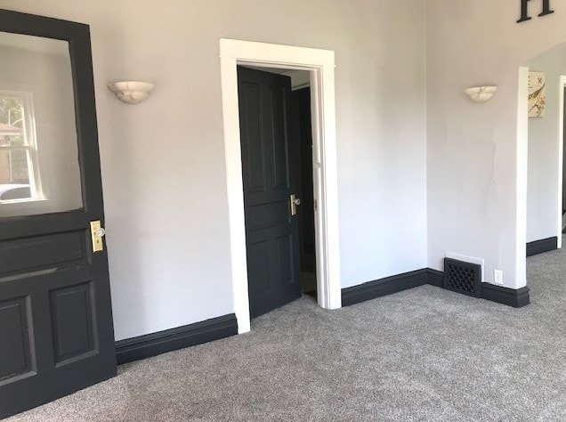1639 Victoria Ave, North Chicago, IL 60064 - interior space with visible vents, baseboards, and carpet