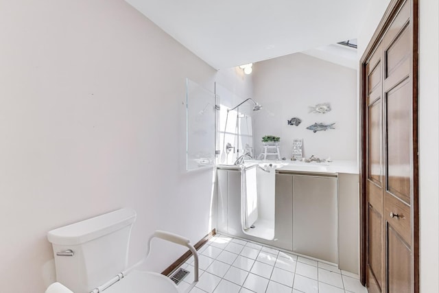 full bath featuring vanity, walk in shower, tile patterned floors, and toilet