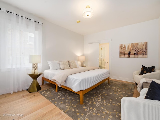 2206 W 107th Pl, Chicago, IL 60643 - bedroom featuring baseboards and wood finished floors