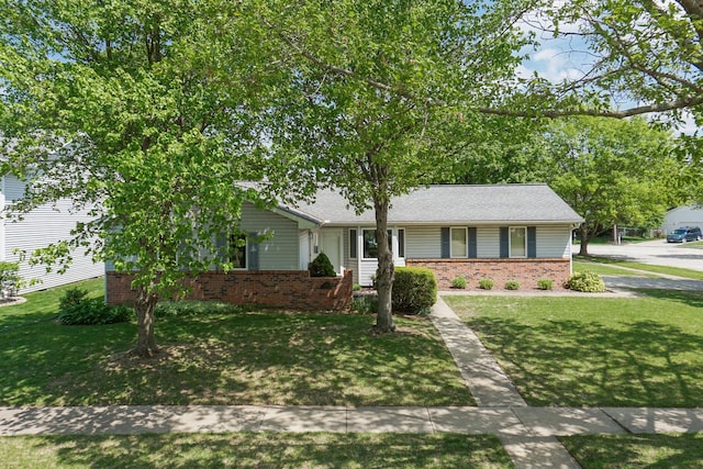 608 Cheshire Dr, Bloomington, IL 61704 - ranch-style home featuring brick siding and a front lawn