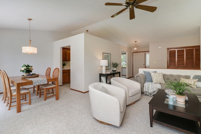 608 Cheshire Dr, Bloomington, IL 61704 - living room featuring vaulted ceiling, light carpet, ceiling fan, and baseboards