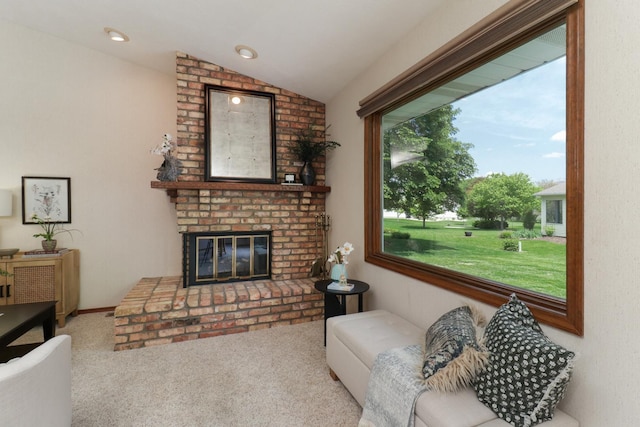 608 Cheshire Dr, Bloomington, IL 61704 - carpeted living area featuring lofted ceiling and a brick fireplace