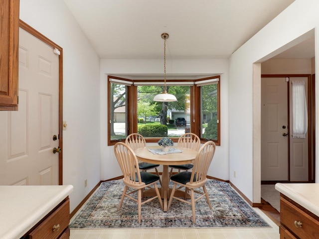 608 Cheshire Dr, Bloomington, IL 61704 - dining area featuring baseboards