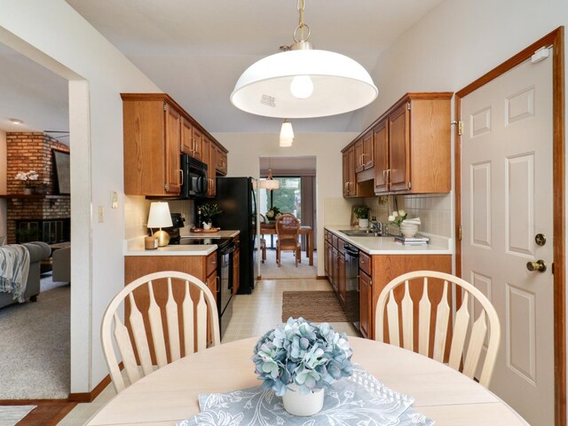 608 Cheshire Dr, Bloomington, IL 61704 - dining space featuring a fireplace