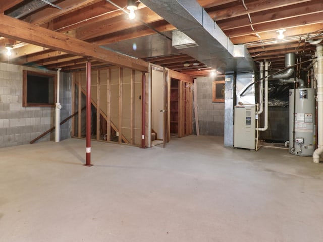 608 Cheshire Dr, Bloomington, IL 61704 - unfinished basement with water heater and heating unit