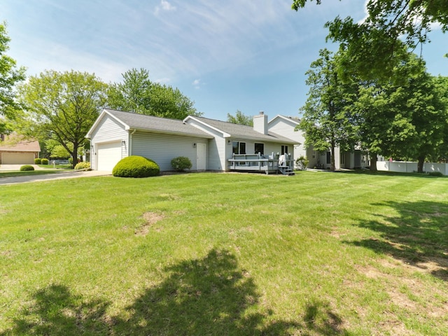 608 Cheshire Dr, Bloomington, IL 61704 - view of front of property featuring a front yard, a chimney, driveway, and a garage
