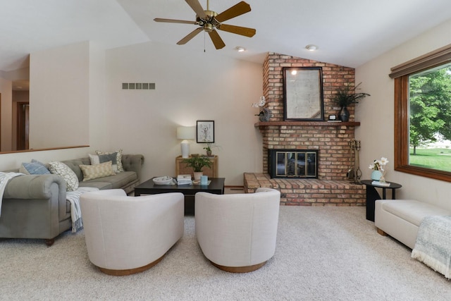 608 Cheshire Dr, Bloomington, IL 61704 - living room with vaulted ceiling, a ceiling fan, carpet floors, and a fireplace