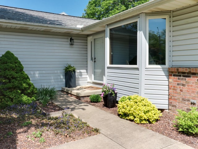 608 Cheshire Dr, Bloomington, IL 61704 - doorway to property with a shingled roof
