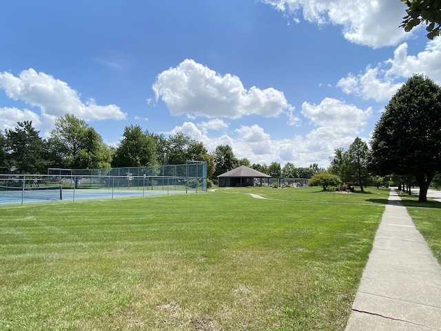 608 Cheshire Dr, Bloomington, IL 61704 - surrounding community with a tennis court