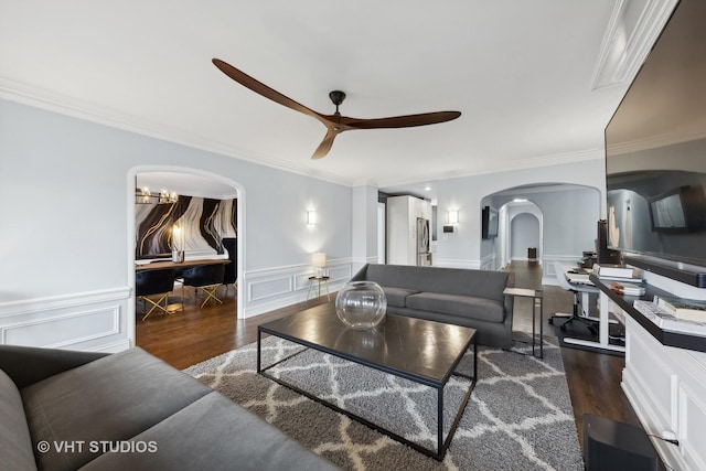 6901 S Oglesby Ave Unit 3A, Chicago, IL 60649 - living room with wood finished floors, a ceiling fan, crown molding, and arched walkways