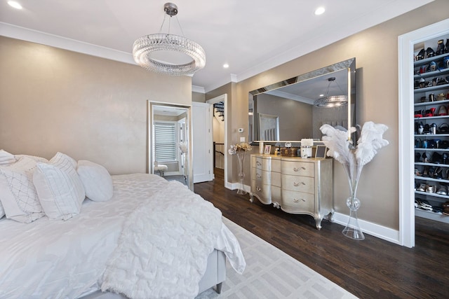 bedroom featuring ornamental molding, baseboards, recessed lighting, and wood finished floors