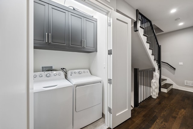 laundry area featuring visible vents, recessed lighting, wood finished floors, cabinet space, and washing machine and dryer