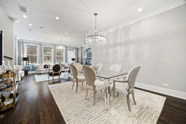 dining area with visible vents, baseboards, recessed lighting, and a chandelier