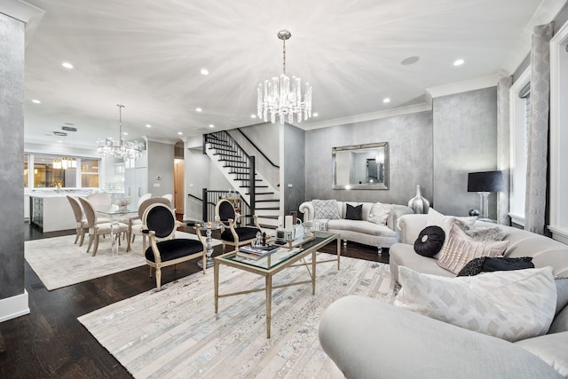 living room featuring recessed lighting, an inviting chandelier, ornamental molding, and stairway