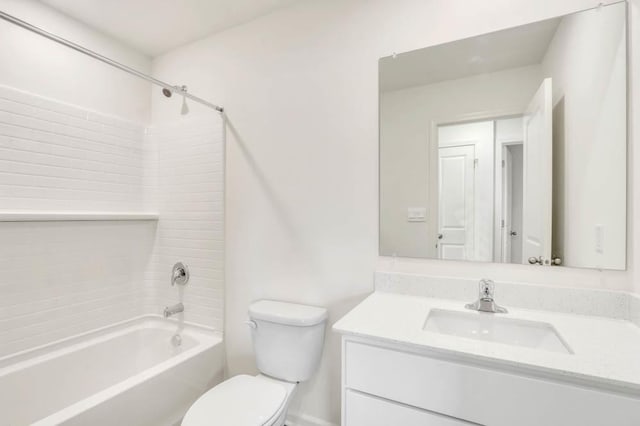 bathroom with bathing tub / shower combination, vanity, and toilet