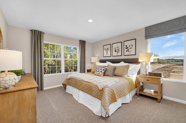 bedroom with carpet flooring, baseboards, and recessed lighting
